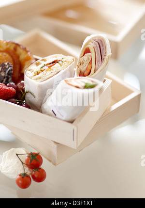 small box sandwich wraps fruit pastry Stock Photo