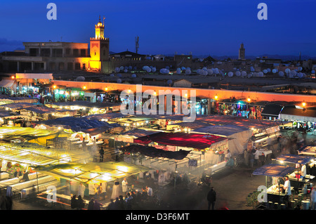 Food stalls set out for weekend evening alfresco dining and entertainment in the world famous Jemaa el-Fnaa Square,Marrakesh, Morocco Stock Photo