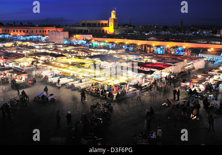 Food stalls set out for weekend evening alfresco dining and entertainment in the world famous Jemaa el-Fnaa Square,Marrakesh, Morocco Stock Photo