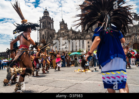 Mexican Amerindians dancing opposite the Cathedral in Zocalo Square, Mexico DF Stock Photo