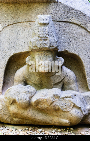 Altar 5 Olmec carving. Seated male figure holding a child on his knees. La Venta, Tabasco, Mexico Stock Photo