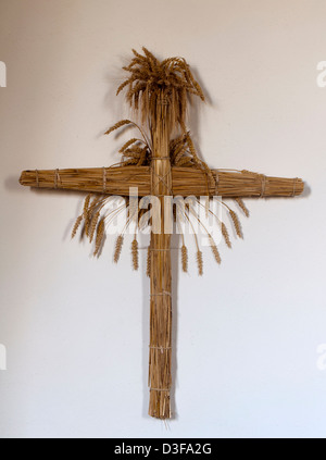 Straw cross in All Saints Church, Turkdean, Gloucestershire, England, UK Stock Photo
