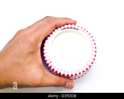 Food can in hand isolated on white background Stock Photo