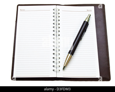 Opened pocket notebook and ballpen on the right Stock Photo