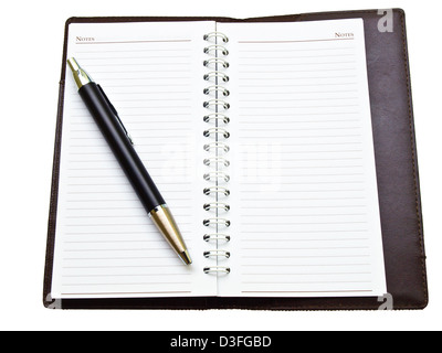 Opened pocket notebook and ballpen on the right Stock Photo