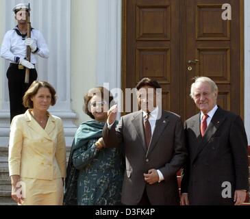 (dpa) - German President Johannes Rau (R) and his wife Christina Rau (L) receive General Pervez Musharraf, President of the Islamic Republic Pakistan (2nd from R), and his wife Sabha Musharraf, in Berlin, 30 June 2003. Musharraf was on a three-day visit in Germany. Stock Photo