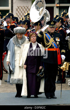(dpa) - Dutch Princess Margriet (L), her sister Princess Christina and her husband Pieter van Vollenhoven arrive in front of the Nieuwe Kerk (new church) in Delft, Netherlands, 11 December 2004. A funeral service took place for Prince Bernhard at the Nieuwe Kerk where he was later entombed at the tomb of the Dutch royal family. Prince Bernhard died on 1 December 2004 at the age of  Stock Photo