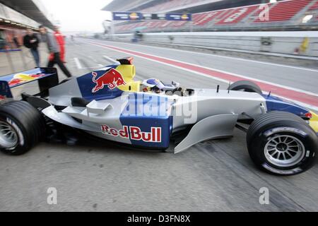 (dpa) - Italian Formula 1 pilot Vitantonio Liuzzi leaves the box in the new Red Bull F1 race car at the Circuit de Catalunya race course in Barcelona, Spain, 24 November 2004. The new team, which emerged from the Jaguar team, will be part of Formula One in 2005. Stock Photo