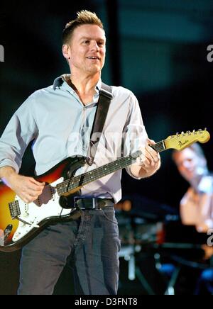 (dpa) - The 43-year-old Canadian singer Bryan Adams performs live on stage during his concert in Magdeburg, Germany, 13 May 2003. Stock Photo