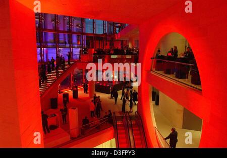 (dpa) - The showrooms of the museum are dipped in red lights for the opening party of Giorgio Armani's exhibition, at the new annex building of the Deutsches Historisches Museum (German historic museum) in Berlin, 7 May 2003. This annex building was designed by the Chinese-American architect I. M. Pei and is so far his only building in Germany. It was opened in February 2003. Stock Photo