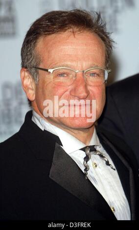 (dpa) - The US actor and Hollywood star Robin Williams ('One Hour Photo', 'Good Will Hunting', 'Dead Poets Society', 'Hook') smiles during the 60th Golden Globe Awards show in Beverly Hills, 19 January 2003. Stock Photo