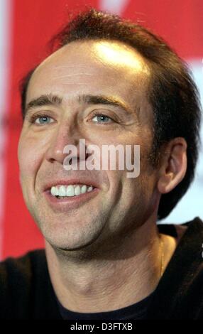 (dpa) - US actor Nicolas Cage, pictured during the screening of his latest movie 'Adaptation' at the 53rd annual film festival in Berlin, 8 February 2003. The film, in which Cage plays a pair of twin brothers, is a satire and a black comedy about Hollywood in which reality and fiction become blurred. The film runs in competition for the Golden Bear awards. Stock Photo