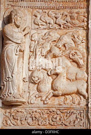 VERONA - JANUARY 27: Relief of creation from facade of romanesque Basilica San Zeno. Stock Photo