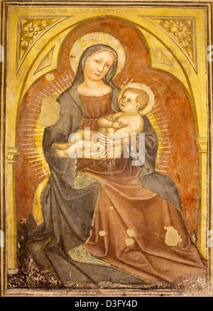 VERONA - JANUARY 27: Madonna fresco from 12. - 15. cent. by anonym author in Basilica di San Zeno Stock Photo
