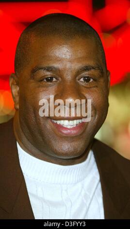 (dpa) - Earvin 'Magic' Johnson, the former US basketball star and, today,  actor and film producer, smiles before the premiere of the film 'Biker Boyz' in Hollywood, 28 January 2003. Stock Photo