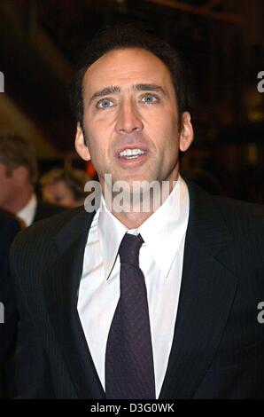 (dpa) - US actor Nicolas Cage arrives to the German premiere of his latest movie 'Adaptation' at the 53rd annual film festival in Berlin, 8 February 2003. The film, in which Cage plays a pair of twin brothers, is a satire and a black comedy about Hollywood in which reality and fiction become blurred. The film runs in competition for the Golden Bear awards. Stock Photo