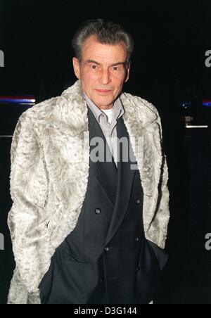 (dpa files) - German actor Horst 'Hotte' Buchholz arrives to the German premiere of the animated movie 'Mulan', in which he is the German voice of the Emperor, in Cologne, Germany, 7 November 1998. The German legend died 3 March 2003 at the age of 69 in Berlin of a 'serious illness'. Buchholz was one of the few German actors to come to international fame and to succeed in Hollywood Stock Photo