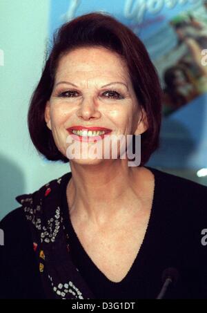 (dpa files) - Italian actress Claudia Cardinale smiles in Berlin, 22 February 1996. On 15 April 2003 she will celebrate her 65th birthday. Cardinale was born in 1938 in Tunis, Tunisia, and after winning a teenage beauty-contest she took acting lessons in Rome. In the following years Cardinale starred or co-starred in dozens of films, including some of the most distinguished Italian Stock Photo