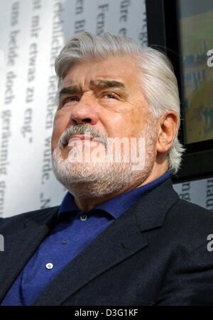 (dpa) - Actor Mario Adorf pictured during the Book Fair in Leipzig, Germany, 21 March 2003. He came to the fair to promote his new book 'Der Fotograf von San Marco' (the photographer of San Marco). Mario Adorf, born on 8 September 1930 in Zurich, Switzerland, appeared in many European film productions, including the German films 'The Lost Honor of Katharina Blum', 'The Tin Drum' an Stock Photo