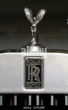 (dpa) - The famous winged 'Emily', the Rolls Royce hood ornament, sparkles atop a Rolls Royce 'Phantom' model car in a showroom at the auto show in Detroit, Michigan, USA, 5 January 2003.  At the auto show, car manufacturer BMW officially presented the new luxury car, which has a V12 engine, is 5.83 meters long, and starts at 350,000 Euro. Stock Photo