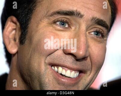 (dpa) - US actor Nicolas Cage, pictured during the screening of his latest movie 'Adaptation' at the 53rd annual film festival in Berlin, 8 February 2003. The film, in which Cage plays a pair of twin brothers, is a satire and a black comedy about Hollywood in which reality and fiction become blurred. The film runs in competition for the Golden Bear awards. Stock Photo