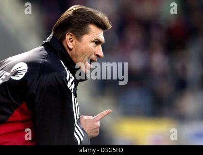 (dpa) - Leverkusen's coach Klaus Augenthaler gestures during the Bundesliga soccer game opposing Bayer 04 Leverkusen and TSV 1860 Munich in Leverkusen, Germany, 29 November 2003. Although Munich led the game 2-0 the game ended in a 2-2 draw. Stock Photo