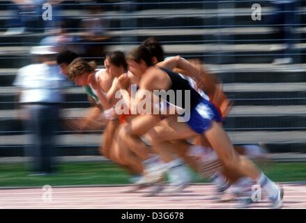 (dpa file) - A group of runners sprint along a track during the German athletics Championship in Ulm, Germany, 13 July 1985. Stock Photo