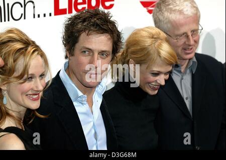 (dpa) - The lead cast of 'Love Actually', (from L:) British actors Laura Linney and Hugh Grant, German actress Heike Makatsch and director Richard Curtis present their film in Munich, 14 November 2003. Stock Photo