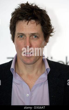 (dpa) - British actor Hugh Grant presents his latest film 'Love Actually' at a press conference in Munich, Germany 14 November 2003. The film will be released throughout Germany on 20 November 2003. Stock Photo