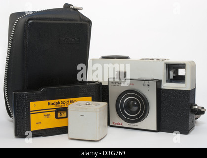 kodak instamatic 25 126 camera with case, 126 film cartridge and hot shoe adapter for cube flash. Stock Photo