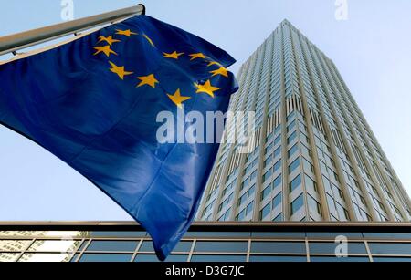 (dpa) - The European flag sways in wind in front of the European Central Bank (ECB) in Frankfurt Main, Germany, 6 November 2003. ECB left its key rates unchanged  in keeping with market expectations, in the first governors meeting chaired by the new president, Jean-Claude Trichet. The main refinancing rate remains at 2.0 per cent, the central deposit facility at 1.0 per cent and th Stock Photo