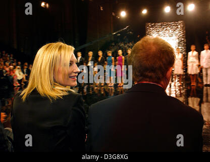 (dpa) - Australian actress Cate Blanchett and her husband Andrew Upton visit the Boss fashion show at the German Opera in Berlin, Friday, 22 July 2005. The fashion company presented the Orange and Black line of its men's and women's summer 2006 collection. Stock Photo