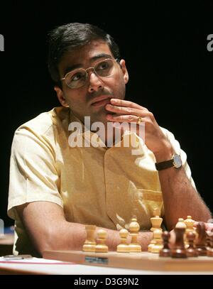 World chess champion Viswanathan Anand of India holds a trophy at an award  presentation ceremony of the FIDE World Chess Championship in Moscow,  Russia, Thursday, May 31, 2012. Anand oretained his title