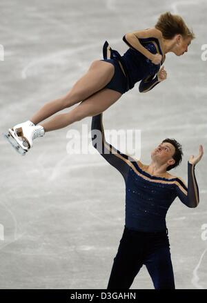 (dpa) Tatajana Totmianina and Maxim Marinin perform during the pair's free skating event at the World Figure Skating Championships in Dortmund, Wednesday, 24 March 2004. Tatajana Totmianina and Maxim Marinin from Russia gained the world champion title, Xue Shen and Hongbo Zhao placed second and Qing Pang and Jian Tong from China gained the third place. Stock Photo
