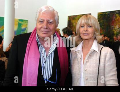 (dpa) - Gunter Sachs, Swiss photographer, arts collector and ex-husband of Brigitte Bardot, with his wife Mirja attends the opening of the new museum building which accomodates the Frieder Burda collection in Baden-Baden, Germany, 22 October 2004. The building was conceived by US architect Richard Meier and the museum was officially opened on Friday, 22 October 2004. Stock Photo