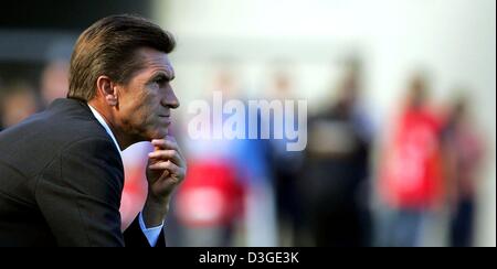 (dpa) - Leverkusen's soccer coach Klaus Augenthaler watches his team play during the Bundesliga soccer game opposing Bayer 04 Leverkusen and 1st FC Nuremberg in Leverkusen, Germany, 18 September 2004. The game ended in a 2-2 draw. Stock Photo
