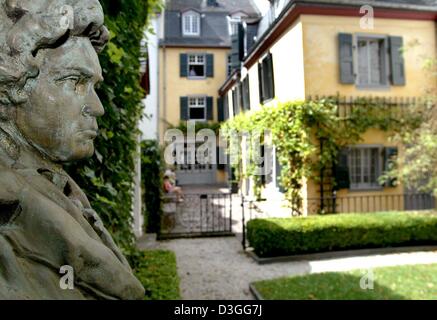 (dpa) - A bust of composer Ludwig van Beethoven stands in the garden in front of the house where he was born in Bonn, Germany, 11 August 2004. Ludwig van Beethoven was born in Bonn, 17 December 1770 and died in Vienna, 26 March 1827 at the age of 56. Every year about 100,000 visitors come to see Beethoven's birthplace. Stock Photo