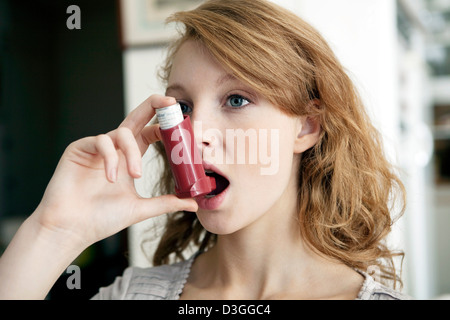 ASTHMA TREATMENT, WOMAN Stock Photo