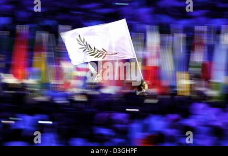 (dpa) - A runner carries an olive branch flag which represents peace during the opening ceremony of the 2004 Olympic Games in Athens, Greece, 13 August 2004. Stock Photo