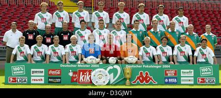 (dpa) - The full squad for the 2004/05 season of reigning German Bundesliga champ SV Werder Bremen poses for a team photo in Bremen, Germany, 28 July 2004. Pictured are: (top row from L to R) Petri Pasanen, Angelos Charisteas, Tim Borowski, Valerien Ismael, Frank Fahrenhorst, Frank Baumann, Johan Micoud, Paul Stalteri, (middle row from L to R) team manager Klaus Allofs, head coach  Stock Photo