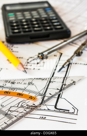 tools and mechanisms detail on the background of engineer drawings Stock Photo