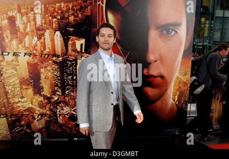 (dpa) - US actor Tobey Maguire arrives at the European premiere of 'Spider Man 2' in which he plays the title role, in Berlin, Germany, 6 July 2004. The plot centres around photographer Peter Parker who wants to rid himself of his alter ego 'Spider Man' to live a normal life and have more time for his girlfriend MJ. The movie officially opens on 8 July 2004. Stock Photo