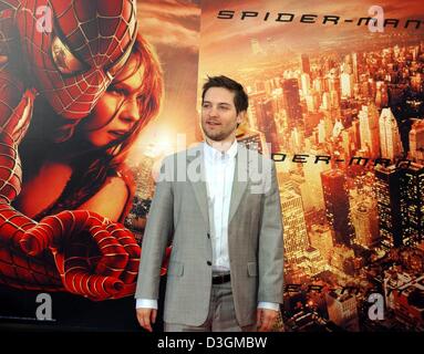 (dpa) - US actor Tobey Maguire arrives at the European premiere of 'Spider Man 2' in which he plays the title role, in Berlin, Germany, 6 July 2004. The plot centres around photographer Peter Parker who wants to rid himself of his alter ego 'Spider Man' to live a normal life and have more time for his girlfriend MJ. The movie officially opens on 8 July 2004. Stock Photo