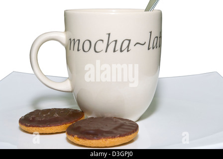 Coffee Mug And Jaffa Cakes On a White Plate Stock Photo