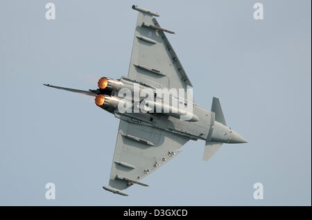 RAF Typhoon FGR4 Eurofighter jet fighter plane from 6 Sqn flying at the airshow at Folkestone, Kent, showing its reheat afterburner. Space for copy