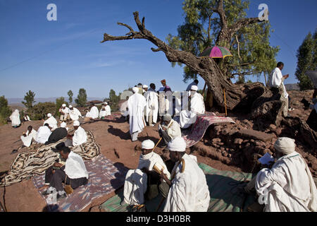A Priest Reads From The Scriptures, Outdoor Church Service, Lalibela, Ethiopia Stock Photo