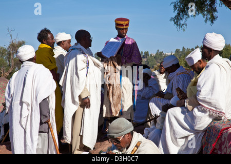 A Priest Reads From The Scriptures, Outdoor Church Service, Lalibela, Ethiopia Stock Photo