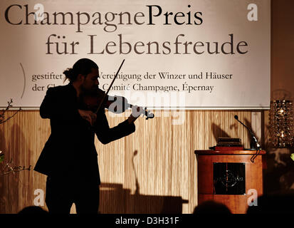 German star violinist David Garrett performs during the award ceremony for the 'Champagne-Preis fuer Lebensfreude 2013' (lit. Champagne Prize for zest of life award) in Hamburg, Germany, 11 February 2013. The award honours personalities who have shown a committment and promoted 'a lust and way of live' in Germany.  Photo: Georg Wendt