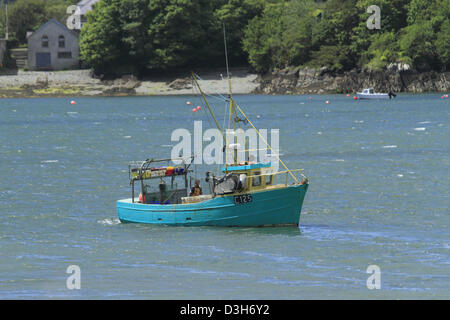A crab fishing boat trawler approaching the pier at Reen, West Cork, Rep of Ireland. Stock Photo