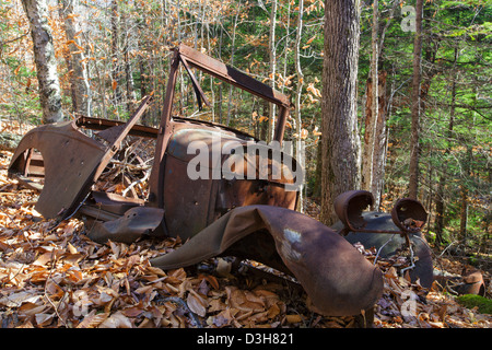 Rusted car in the Eastman Brook drainage of Thornton, New Hampshire USA Stock Photo